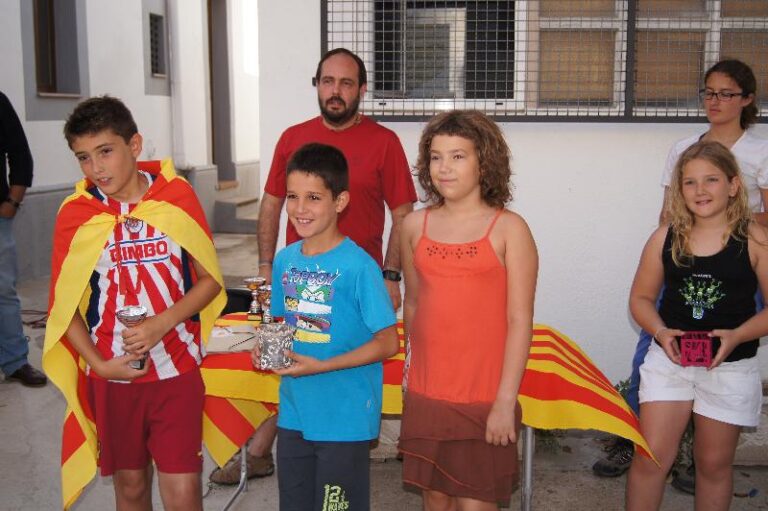 lliurament de la flama als responsables del pla de estany