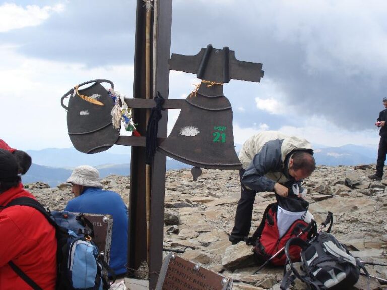 Olla i campana sota la creu