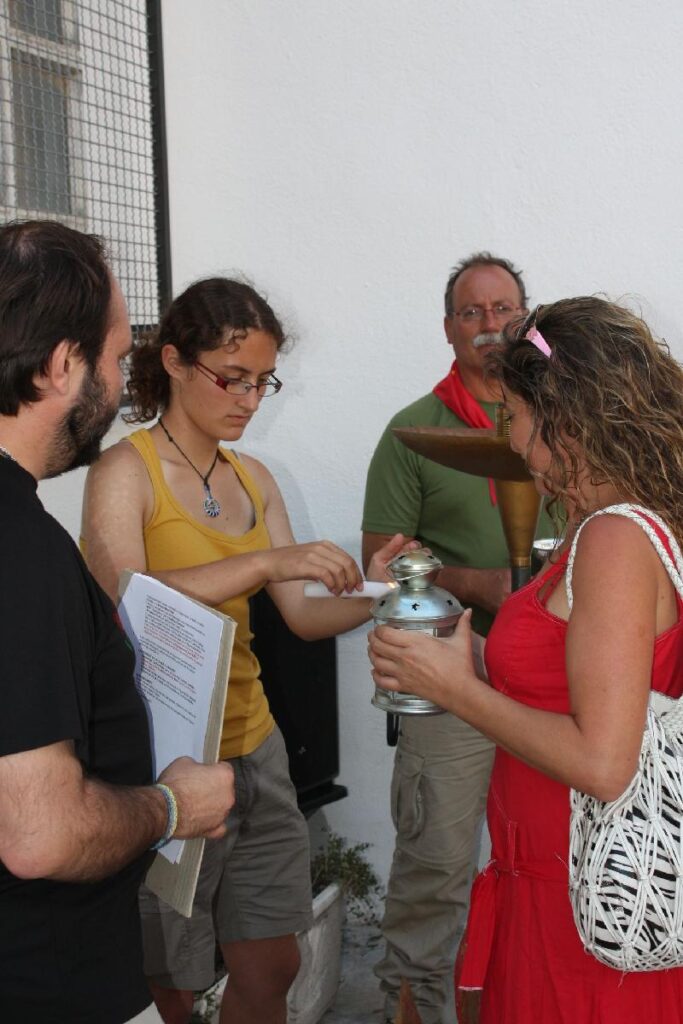 lliurament del foc al responsabre de Pla??a dels jocs